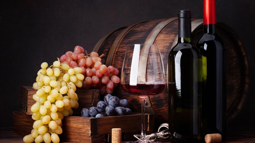 Wine bottles, grapes, glass of wine